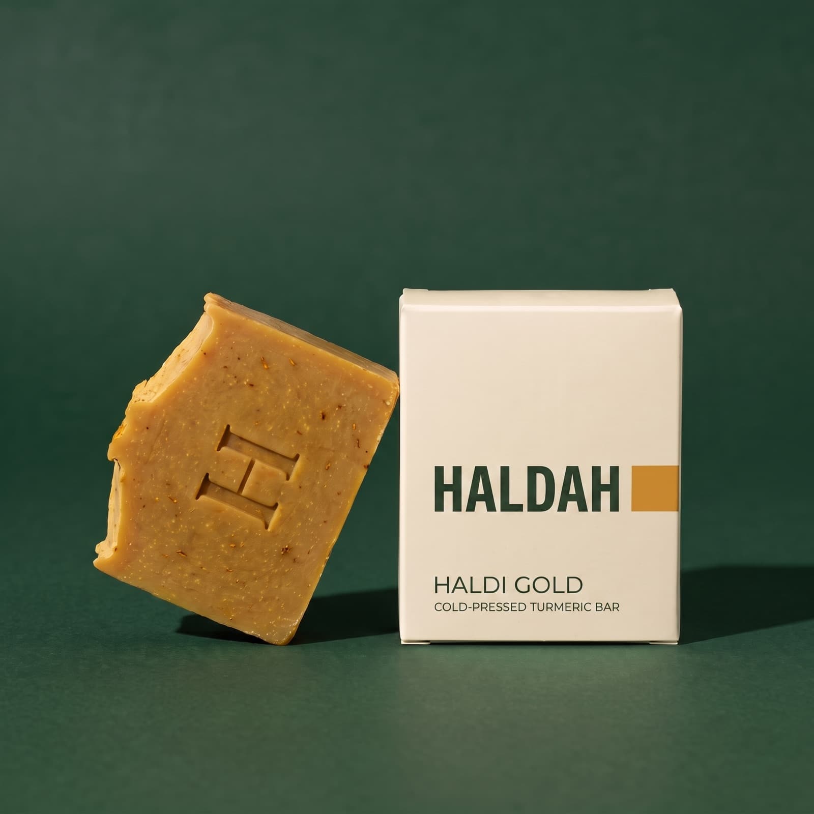 Haldi Gold beside its box, the H pressed into the bar